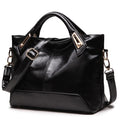 Shiny leather handbag Kamorrus