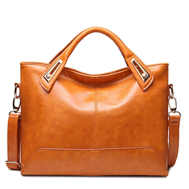 Shiny leather handbag Kamorrus